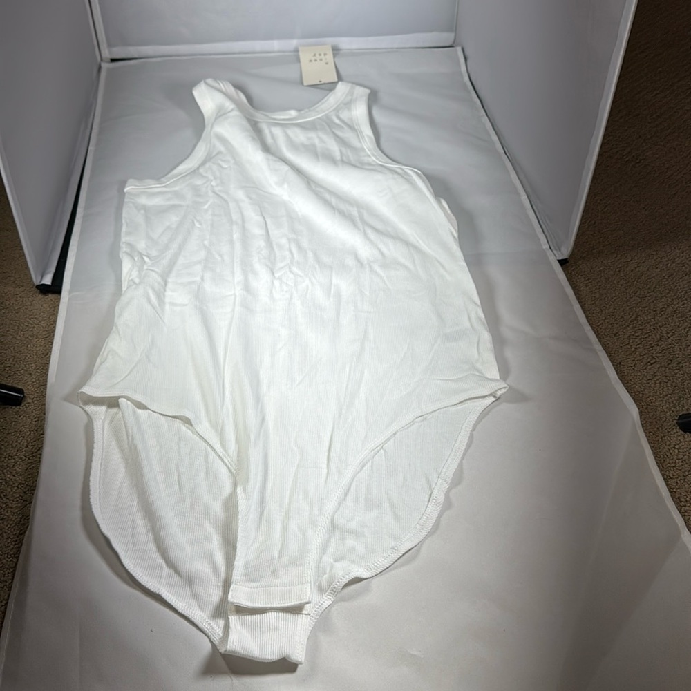 White body suit, size xl. Brand new.